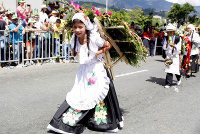 A young silletera in last year's parade with her silleta
