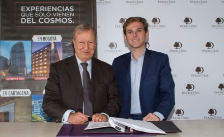 Richard Cajiao, Cosmos Group, and Juan Corvinos, Hilton Worldwide, sign agreement to open two DoubleTree by Hilton hotels in Bogota, Colombia. (Photo: Business Wire)
