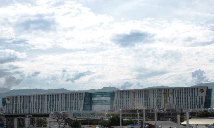 Grupo Bancolombia's massive global headquarters complex is a prominent feature in Medellin's city landscape.