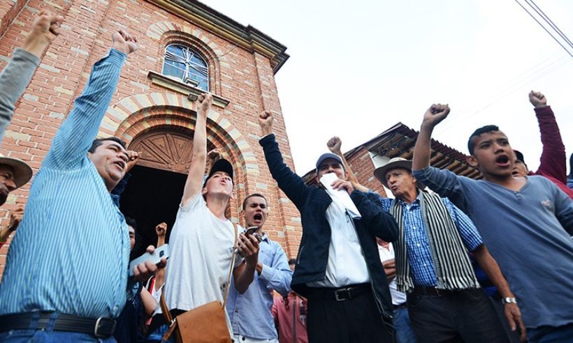 The residents of Sucre in the department of Santander celebrate the results of a special referendum on October 1. In this small town, 99% of voters said they did not want mining projects in the mostly agricultural county. (Credit: aJuan Carlos Higuera)
