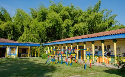 Sede Barragán is small and, like many rural Colombian schools, lacks resources. But the students take great pride in their school, which features the colors and design typical of buildings throughout coffee country. (Credit: Jared Wade)