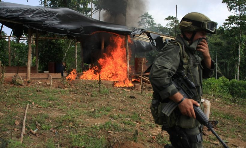 Colombian law enforcement burn a coca laboratory in the Colombian department of Narino. (Credit: Policía Nacional de Colombia / AP, William Fernando Martinez)