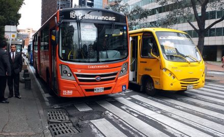 Buses operating on the streets of Bogota, Colombia. (Photo credit: Jared Wade)