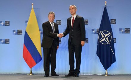 Juan Manuel Santos shakes hands with Jens Stoltenberg, secretary general of NATO, in the president's visit to advance Colombia's relationship with the alliance as a