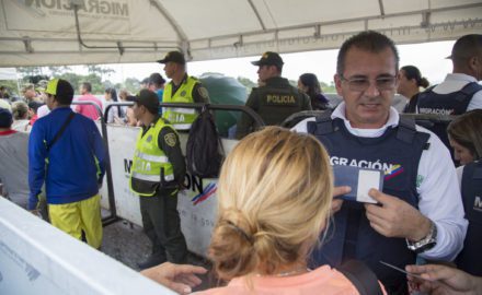 Migration officials work at the Colombian/Venezuelan border city of Cúcuta, where tens of thousands of Venezuelans cross every day due to the desperate social conditions and economic crisis occurring in their homeland. (Credit: National Police of Colombia)