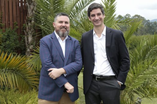 Clyde Hutchinson, director of Viva Air Labs, and Félix Antelo, president and CEO of Viva Air, celebrate the opening of the innovation center. (Credit: Viva Air)