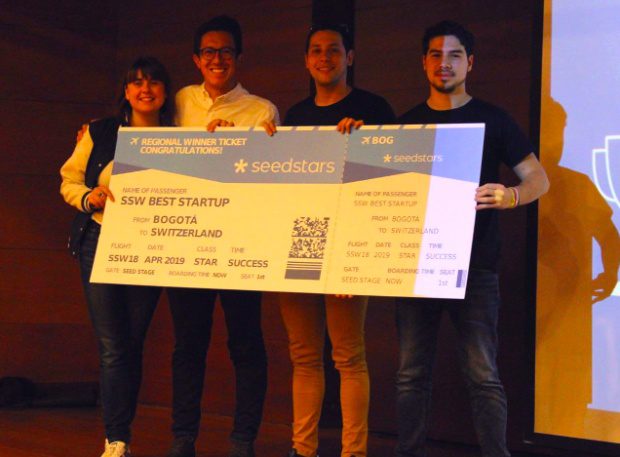 The winners celebrate on stage in Bogotá. (Credit: Seedsters)