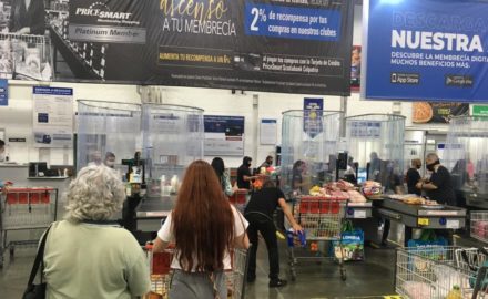Above: PriceSmart has installed enclosures around cashiers to isolate them from shoppers during checkout, along with other safety measures. Pricesmart Medellín photo: Loren Moss