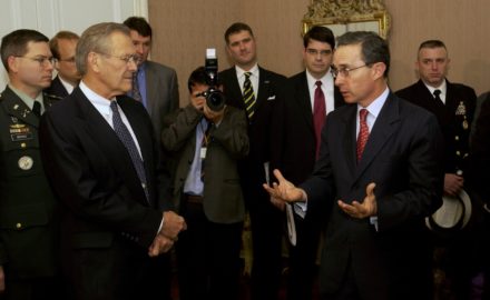 Secretary of Defense Donald H. Rumsfeld (left) listens as President Álvaro Uribe (right) speaks to a group assembled at the Colombian presidential residence on August 19, 2003. (Photo by TSGT Andy Dunaway, U.S. Air Force)
