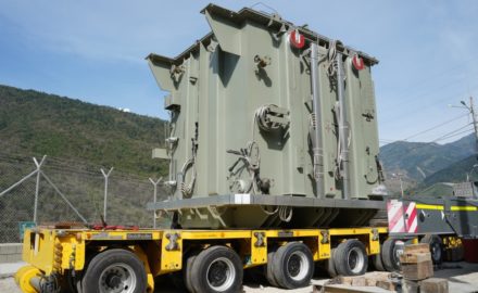 The transformers each have a capacity of 112 MVA (million volt amperes) and will transform the generator output from 18 kilovolts to the grid distribution voltage of 500 kilovolts. Each is 4 meters high and weighs 110 tons when filled with oil.