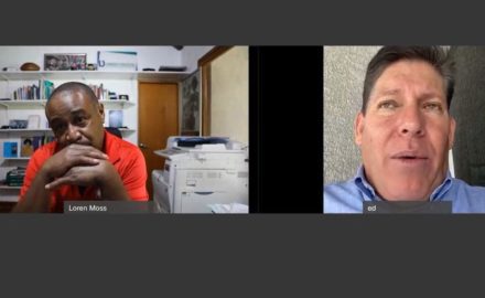 Ed Delgado of Ecuatoreana (right) speaks with Finance Colombia's Executive Editor Loren Moss