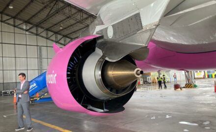 ABOVE PHOTO: Viva CEO Félix Antelo stands in front of a GE LEAP 1A high-bypass turbofan mounted on one of the airiline's brand new Airbus A320neo aircraft painted in its breast cancer awareness livery. (Photo ©Loren Moss)