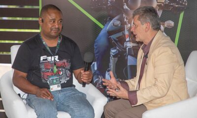 Finance Colombia's Loren Moss (left) interviews F2R organizer Guillermo Pajón.