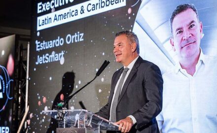 Estuardo Ortiz, founder and CEO of JetSmart Airlines, on stage to receive the Executive Leadership Award at 2023 Airline Strategy Awards.