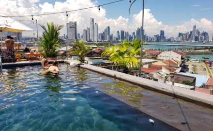 Guests enjoying the rooftop pool at Selina's location in the Casco Viejo historic center of Panama City.