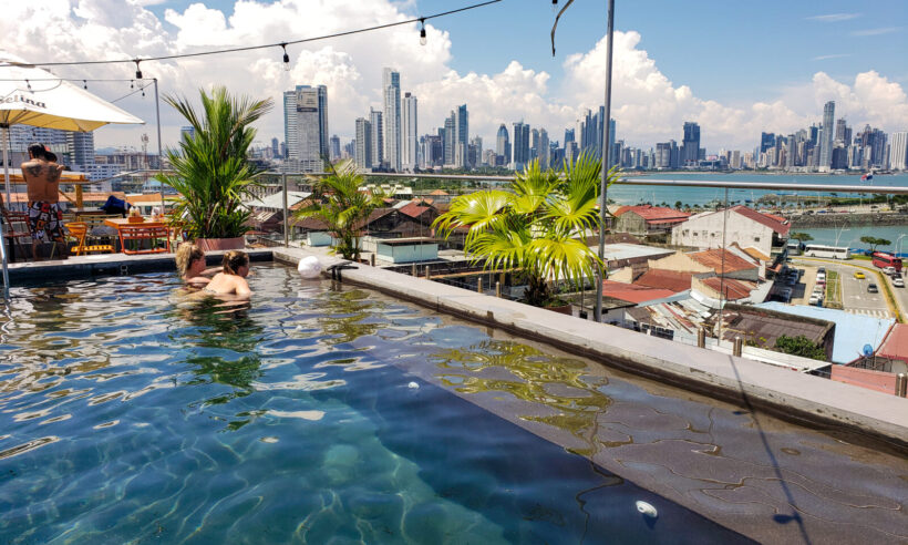 Guests enjoying the rooftop pool at Selina's location in the Casco Viejo historic center of Panama City.