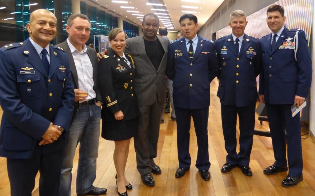 Left to right: Air Force Brigadier General Jose Mauricio Mancera Castaño (Colombia), Alexey Belov, Rosoboronexport (Russia), Army Major Emily Freeman (USA), Finance Colombia Publisher Loren Moss (USA), Lieutenant Colonel Eldar Sadykov (Russia), Air Force Brigadier General Juan Marcos Perdomo Robledo (Colombia), and Air Force Colonel Pete Schaub (USA) at the F-Air Colombia 2015 launch reception.