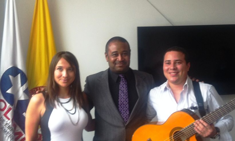 Finance Colombia editor Loren Moss with publicist Liliana Torres Rios (left), and Vallenato artist Beimar Toledo in the offices of the Consejo de Empresas Americanas