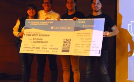 The winners celebrate on stage in Bogotรก. (Credit: Seedsters)