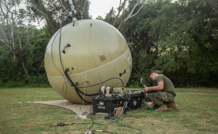 U.S. Marine Cpl. Johnathon Nettles, a data systems administrator with Special Purpose Marine Air-Ground Task Force – Southern Command, finalizes adjustments on a ground antenna transmit and receive (GATR) communications system during the setup of a command operations center in Base de Entrenamiento de Infanteria de Marina, Coveñas, Colombia, Sept. 28, 2019. A GATR is used to establish local area network-based services through a satellite. The task force is conducting training and engineering projects hand-in-hand with partner nation military members in Latin America and the Caribbean during their deployment to the region, which coincides with hurricane season. Nettles is a native of Annapolis, Maryland. (U.S. Marine Corps photo by Sgt. Stanley Moy)