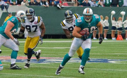 Miami Dolphins tight end running with the football. (Photo credit: Ed Yourdon)