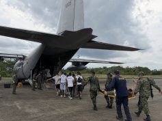 Members of the Colombian Air Force (FAC) assist in the response and evacuation of injured people following the crash. Photo courtesy of the FAC.