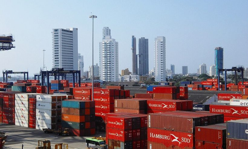 Aerial view of Cartagena port and skyline showing shipping infrastructure and coastal urban development in Colombia.