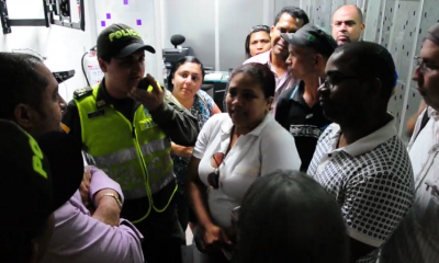 Angry fraud victims confront one of the Global Brokers ringleaders.