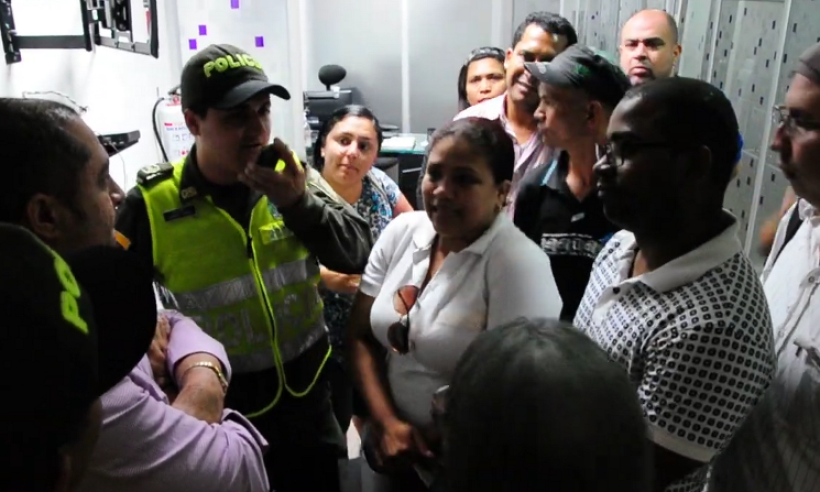 Angry fraud victims confront one of the Global Brokers ringleaders.