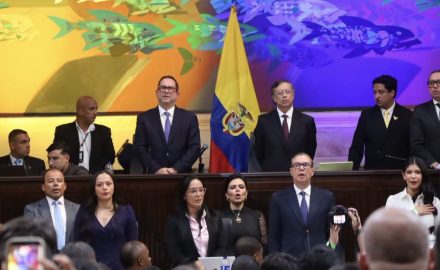 Colombia's 2026 - 2030 Congress is sworn in. Outgoing President Gustavo Petro stands to the right of the Colombian flag, while outgoing Senate President Senator Lidio García stands to its left. Photo courtesy of the Senate of the Republic of Colombia.