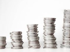 Coins stacked up together to look like a graph. The Financial Superintendency of Colombia estimated that 66% of monetary interactions came from mobile applications. Stock photo by Kevin Schneider via Pixabay.