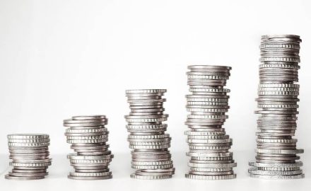 Coins stacked up together to look like a graph. The Financial Superintendency of Colombia estimated that 66% of monetary interactions came from mobile applications. Stock photo by Kevin Schneider via Pixabay.