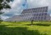 Solar energy panels in an open field.