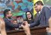 Colombia’s new comptroller general, Jorge Eliécer Laverde, left, shakes hands with Senate President Honorio Henríquez after the vote that elected Laverde to the post. Photo courtesy of the Senate of the Republic of Colombia.
