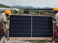 Technicians install solar panels at EPM's Tepuy facility in Colombia (photo courtesy EPM)