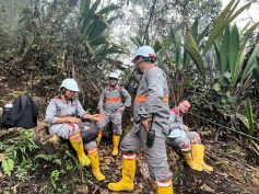 Copper Giant field crew resting on the trail during exploration work at the Mocoa project