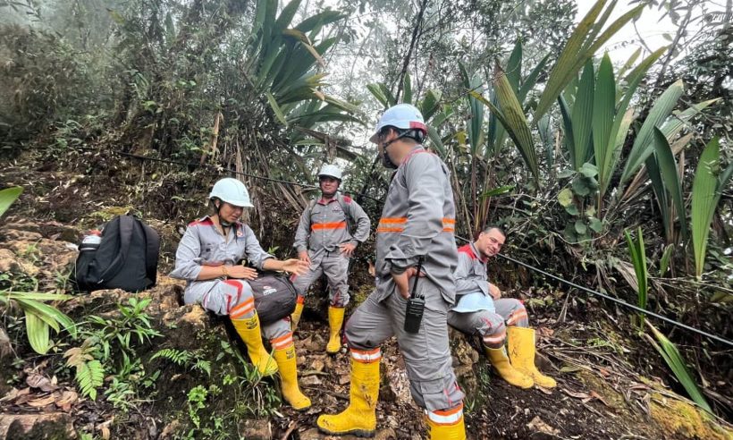 Copper Giant field crew resting on the trail during exploration work at the Mocoa project