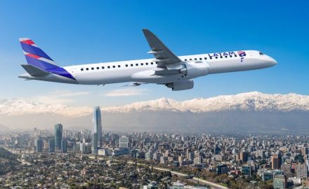 Rendering of an Embraer E195-E2 jet in LATAM livery flying over Santiago with the Andes behind