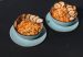 Bowls of Caribbean-style rice topped with fried plantain chips.