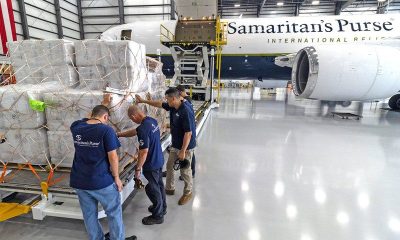 Samaritan's Purse staff load relief cargo onto a 767 aircraft bound for Colombia.