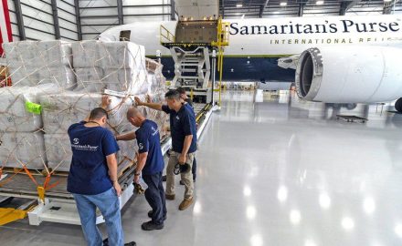 Samaritan's Purse staff load relief cargo onto a 767 aircraft bound for Colombia.