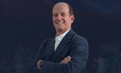 Fernando Isaza Gutiérrez de Piñeres, president of Colombia's Fondo Nacional de Garantías, stands with arms crossed.