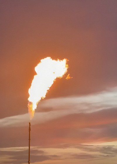 A gas flare burns during well testing at NG Energy's Aruchara-6 well, Maria Conchita block.